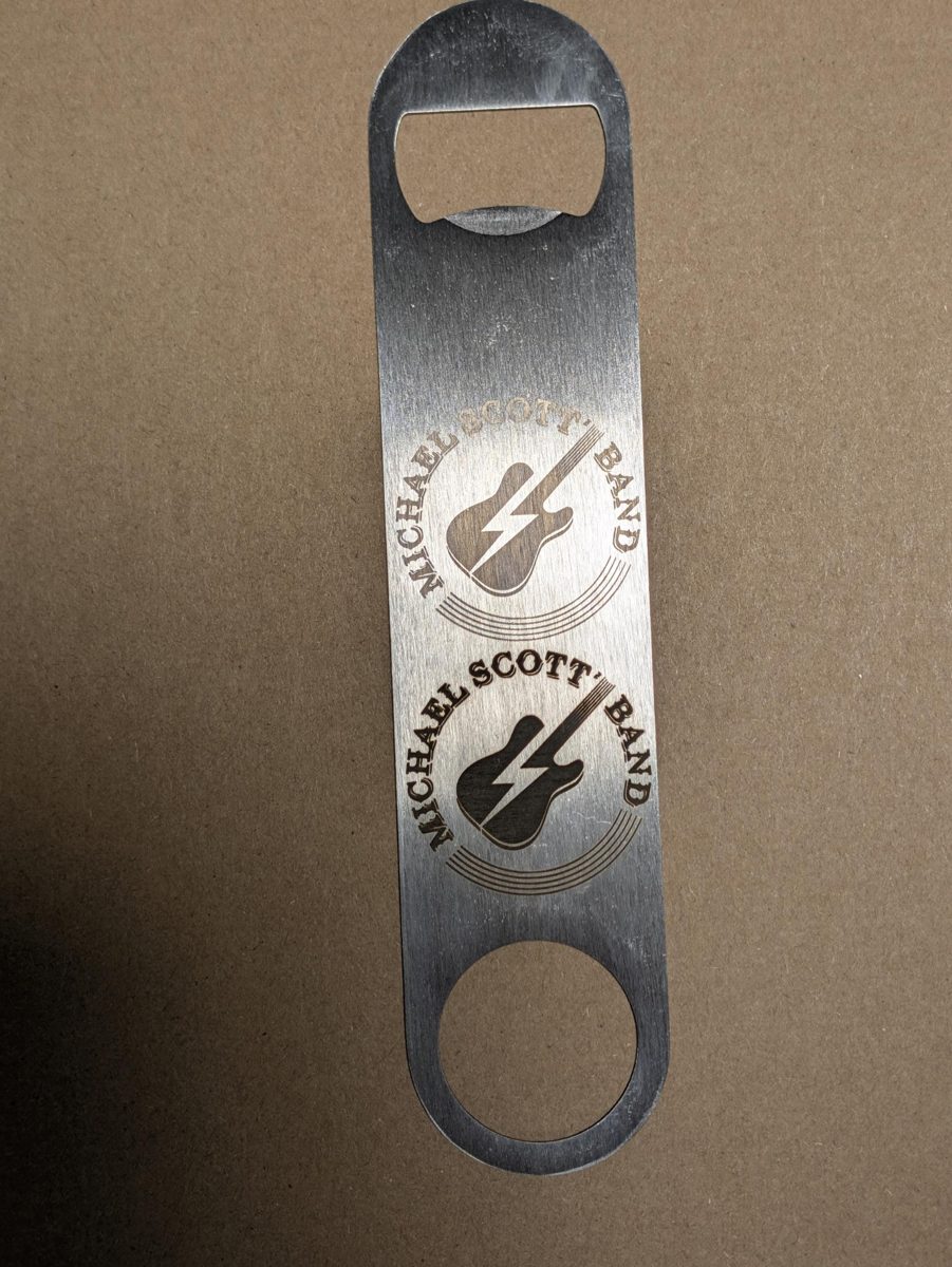 Stainless bar opener engraved with a band logo
