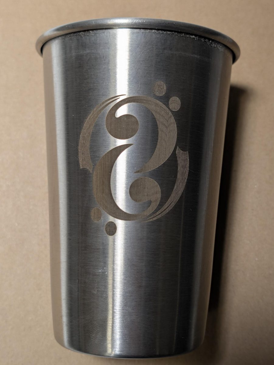 Stainless steel pint cup with a laser engraved logo